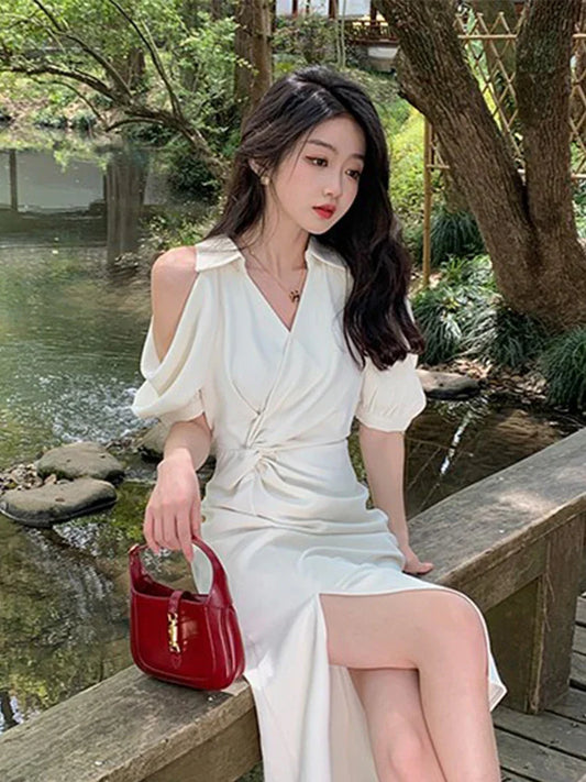 露肩裙襬微開叉女人味洋裝 - TWINKLE