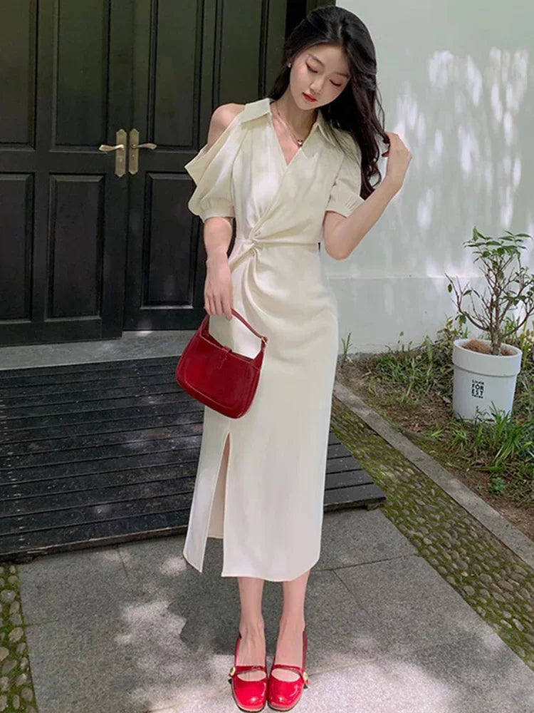 露肩裙襬微開叉女人味洋裝 - TWINKLE